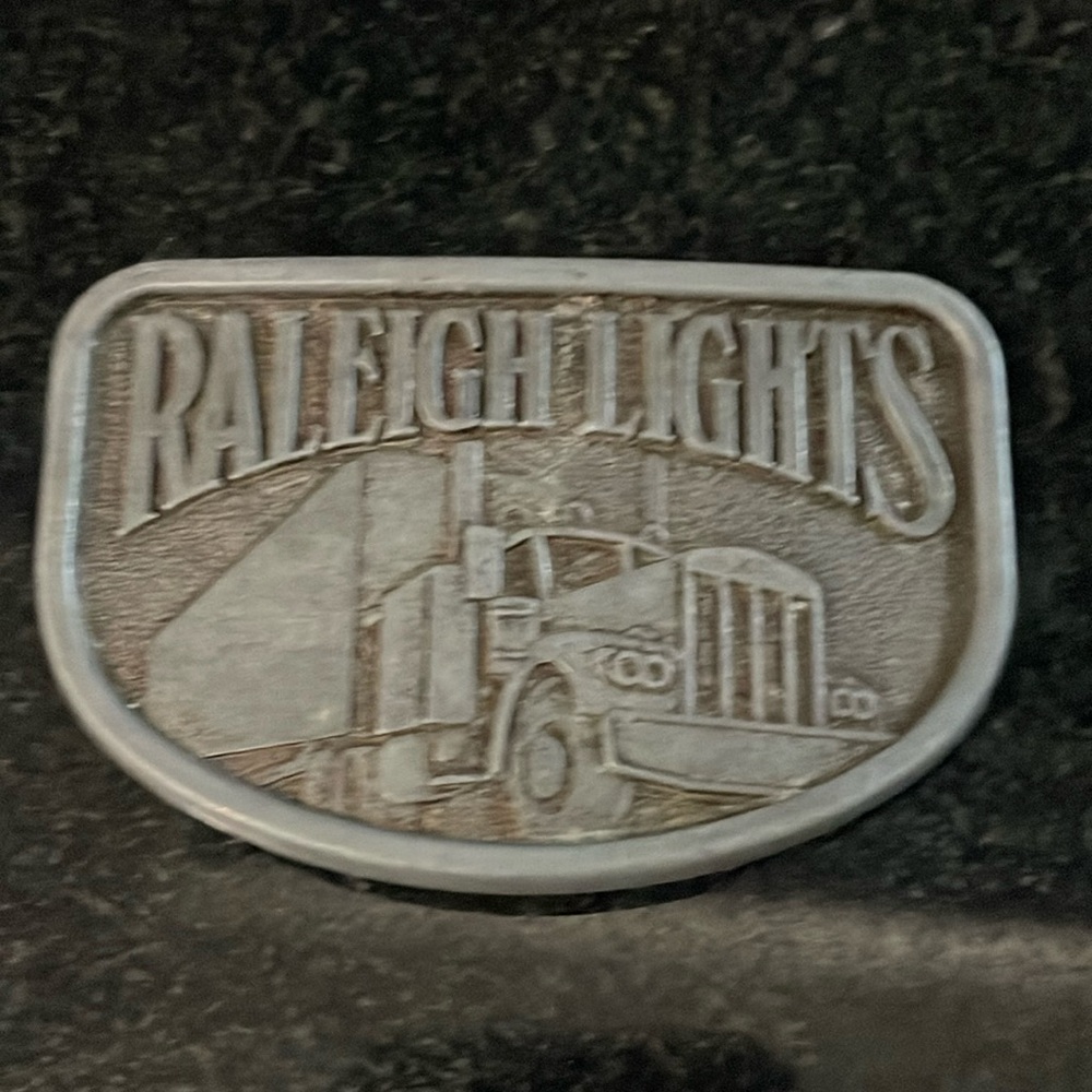 Vintage 1970s Raleigh Lights Trucker Belt Buckle 3 3/8” X 2 1/4” Collectible